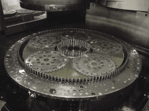 Stock removal of tungsten carbide inset parts using a CBN or diamond particle fixed abrasive wheel